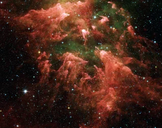 Spitzer Space Telescope valse-kleur beeld van de Zuidelijke Zuil regio van de stervormende regio genaamd de Carina-nevel. Sterembryo